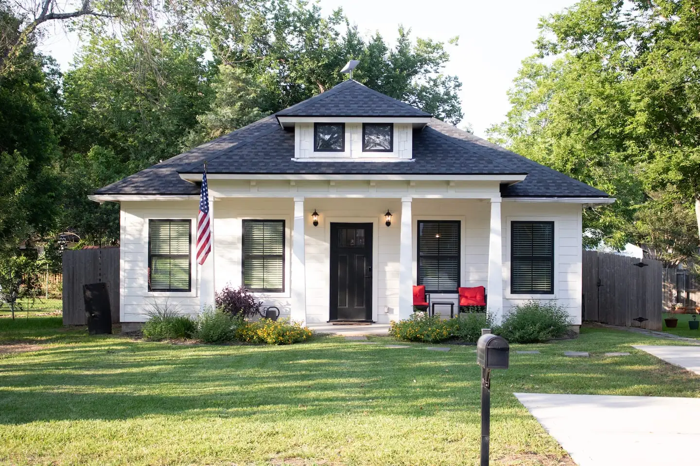 Front of Howdy Home, a white bungalow in historic Bryan