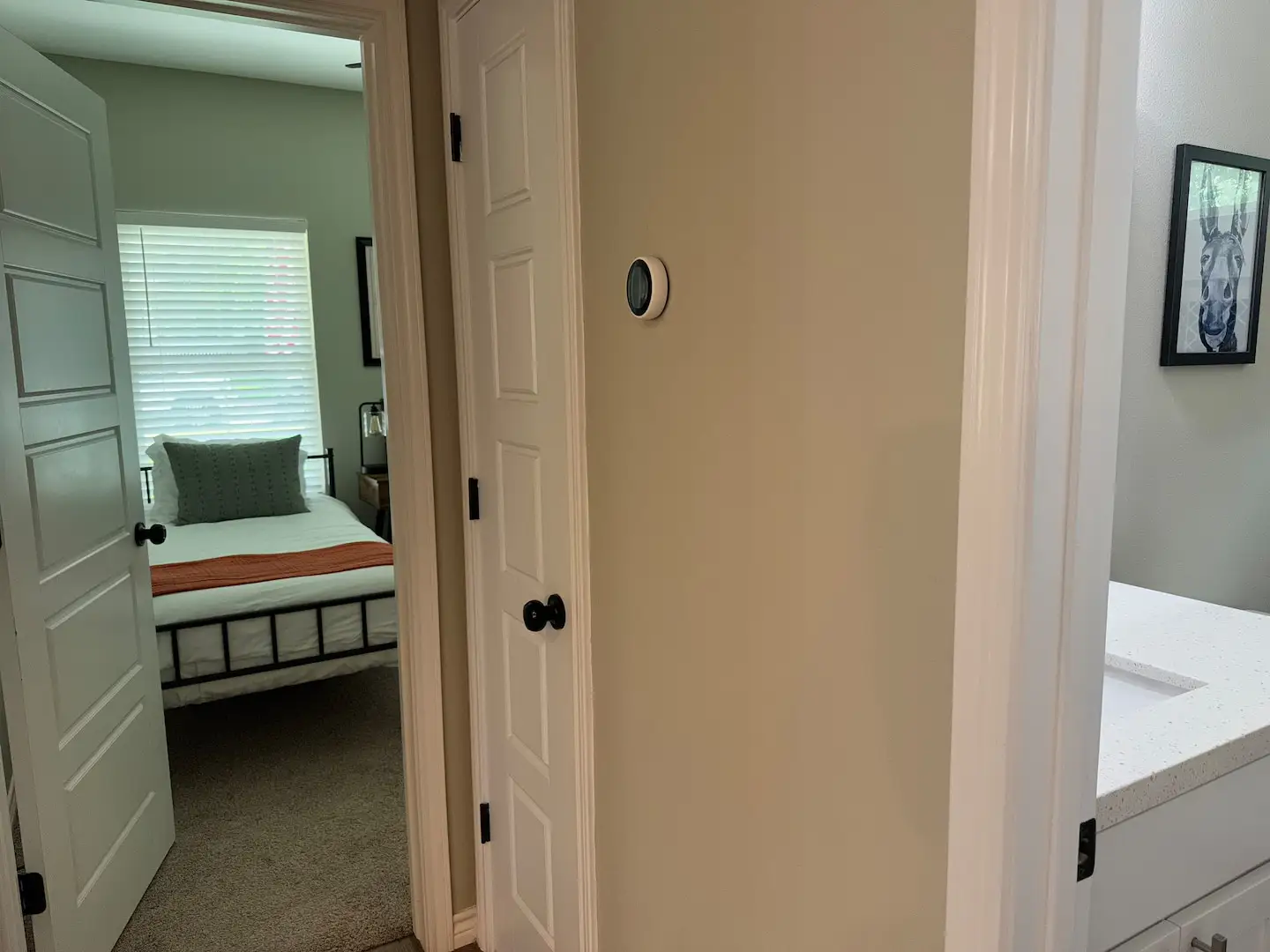 Hallway view into a bedroom