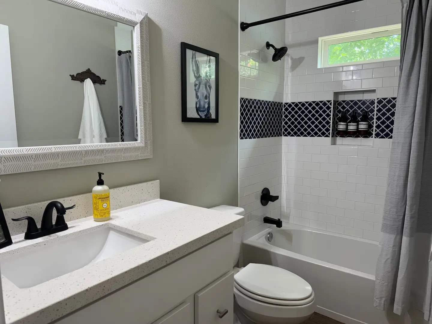 Second bathroom with tub and shower